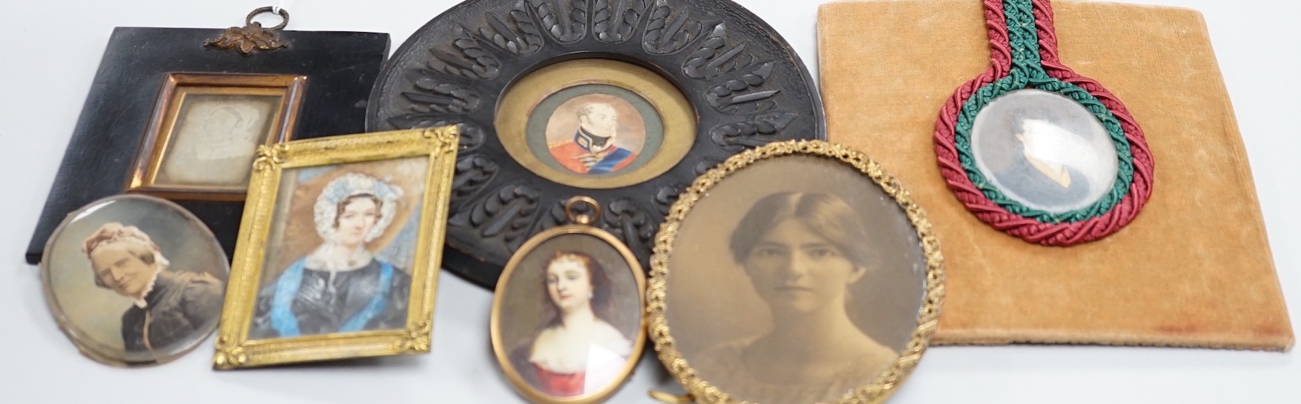 Continental School, 18th century, portrait miniature on ivory, Portrait of a Lady in a red dress, together with six other portraits. To include the subject of military interest: a portrait watercolour of General Isaac Br